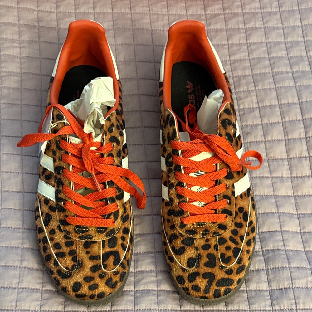 Adidas Animal Print Sneakers with Orange Highlights New with box Unisex sizing.
